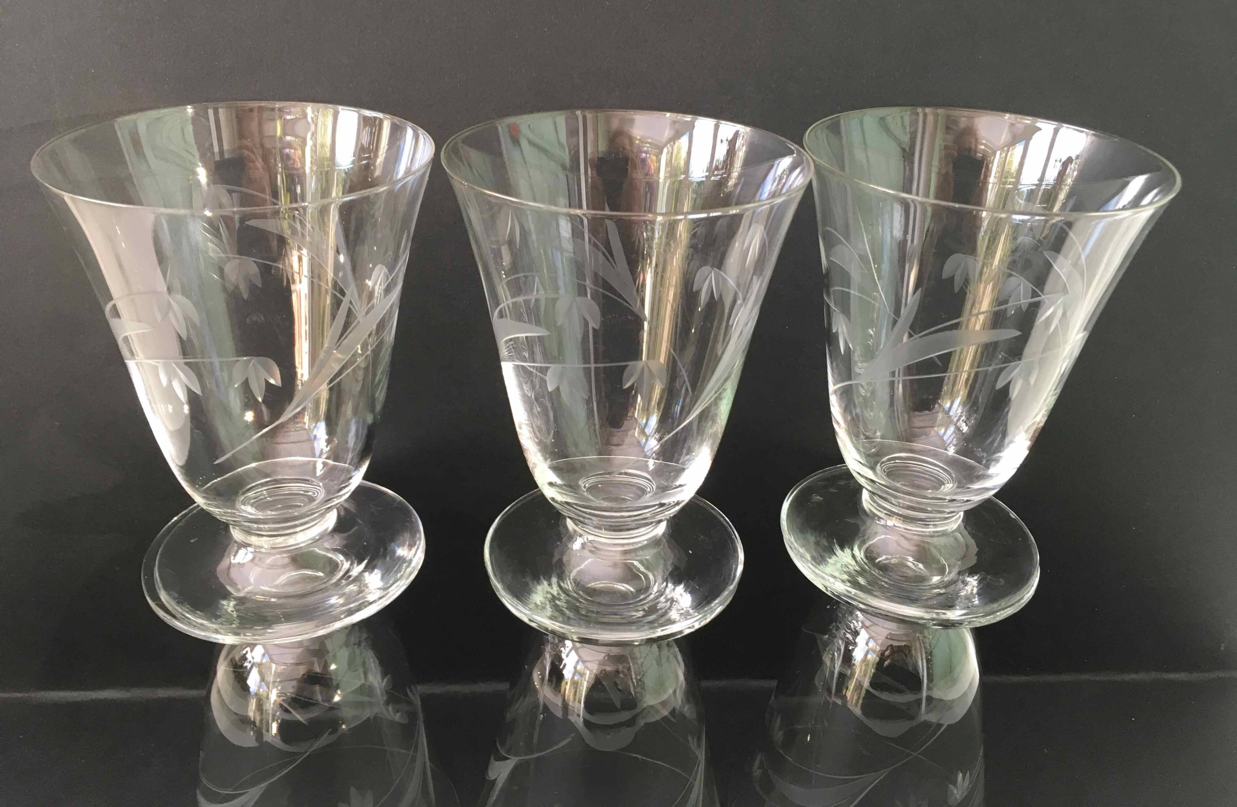 6 wine glasses carved with lily of the valley sprigs