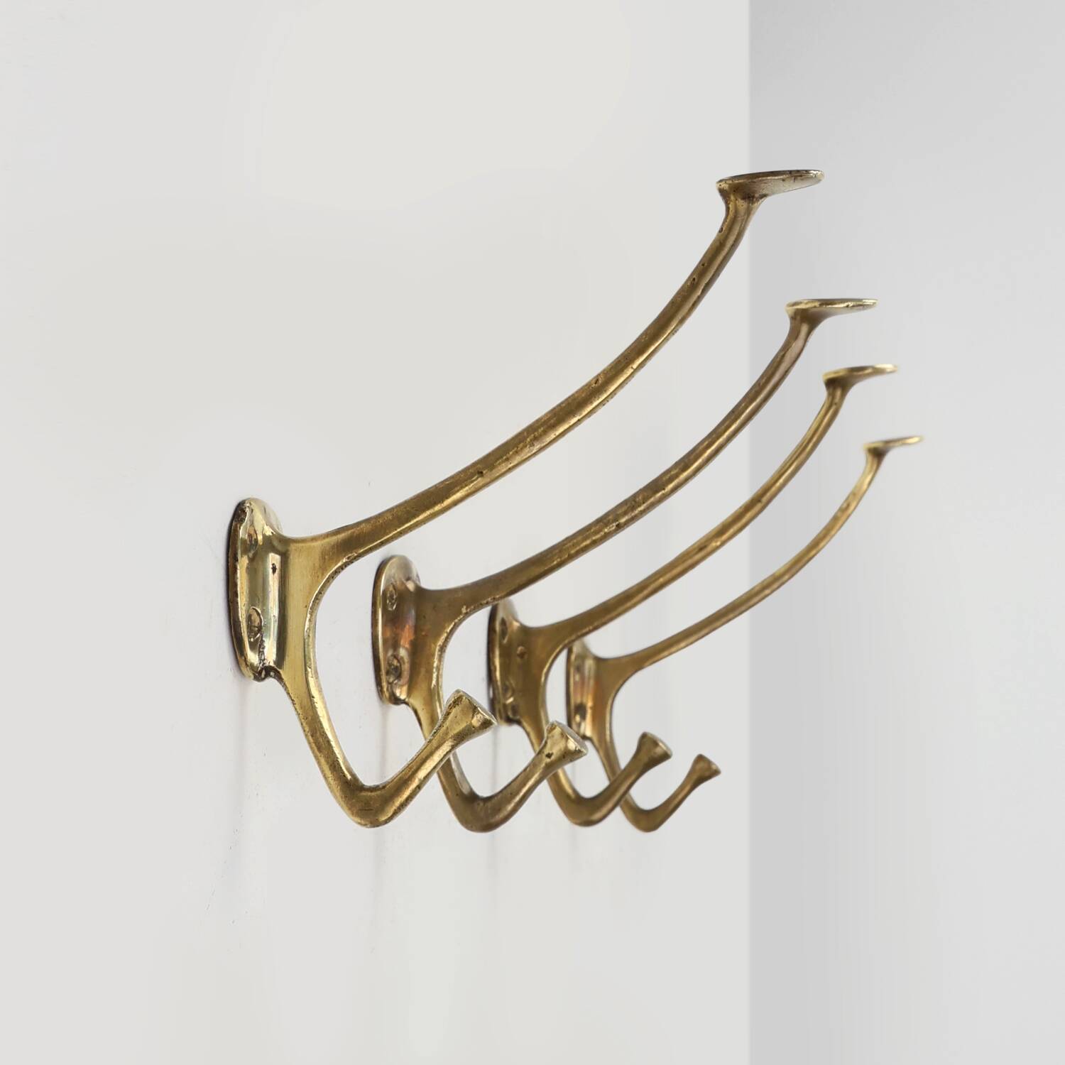 Set of 4 Adolf Loos brass art nouveau wall hooks, Vienna, Austria ca. 1910