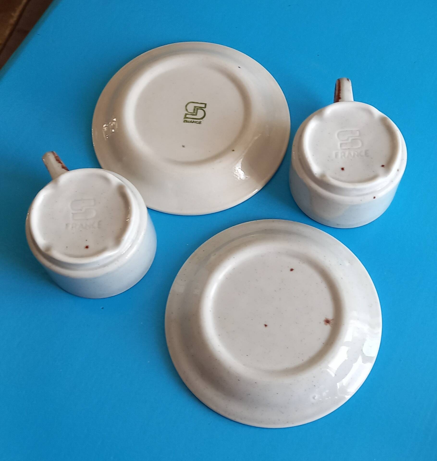2 enameled stoneware espresso cups and saucers - France, 70s/80s