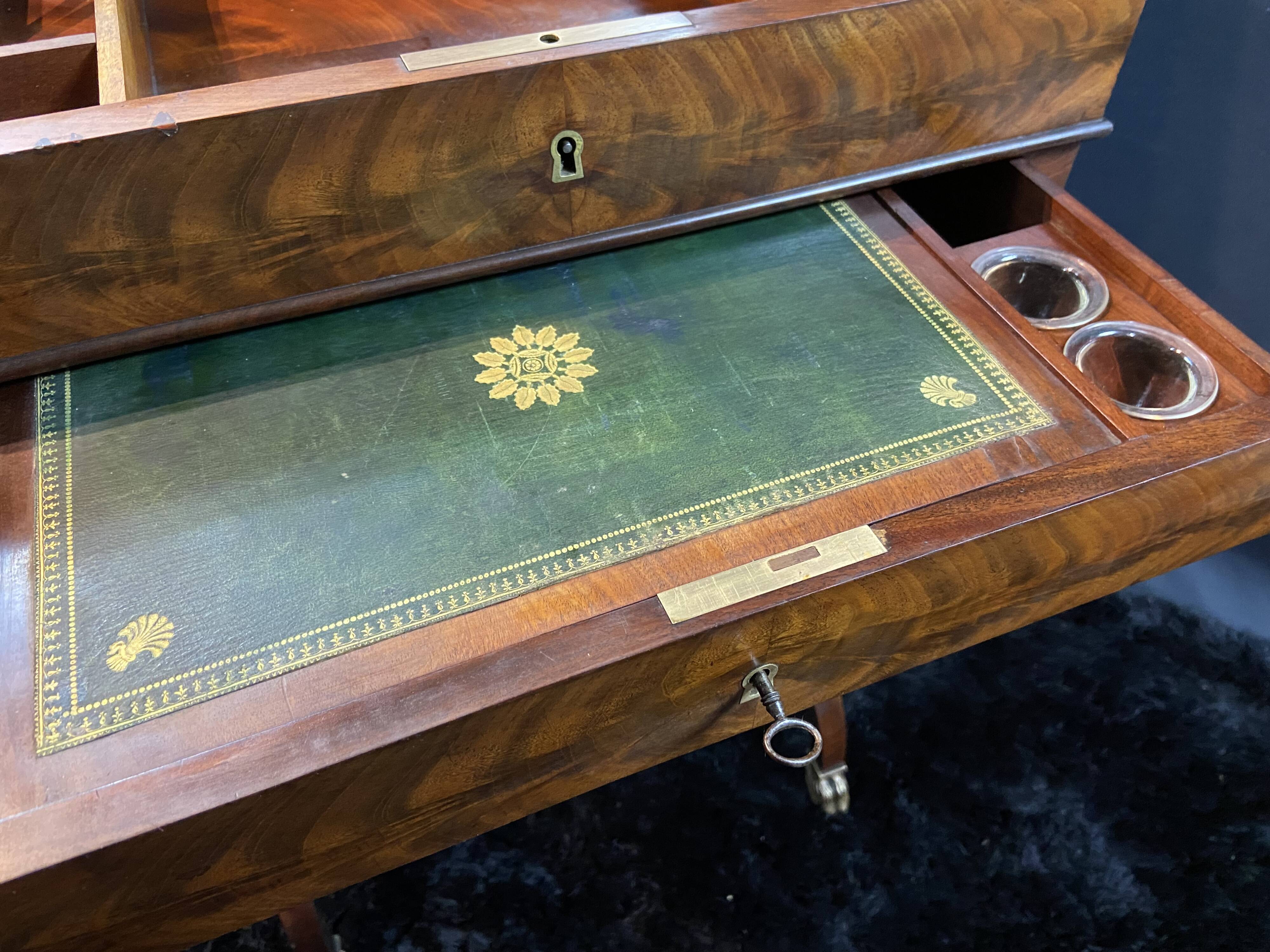 Louis-Philippe period mahogany writing desk with candlestick, 19th century
