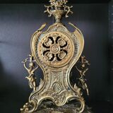 Louis XV style gilded bronze clock