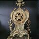 Louis XV style gilded bronze clock