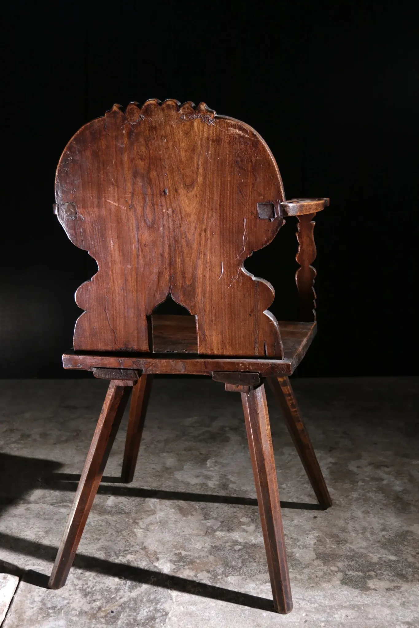 17th century Alpine carved walnut Brettstuhl armchair with grotesque mask