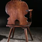 17th century Alpine carved walnut Brettstuhl armchair with grotesque mask