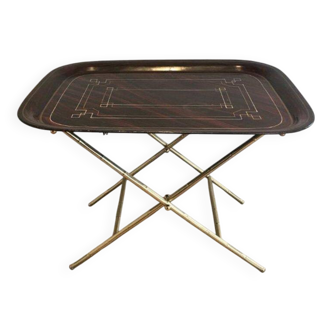 Beautiful table with a brass top and painted sheet metal