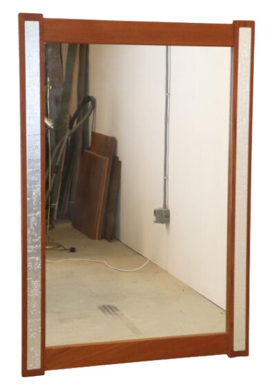Miroir en teck avec des accents argentés