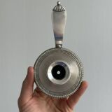 Pair of shiny silver metal candlesticks