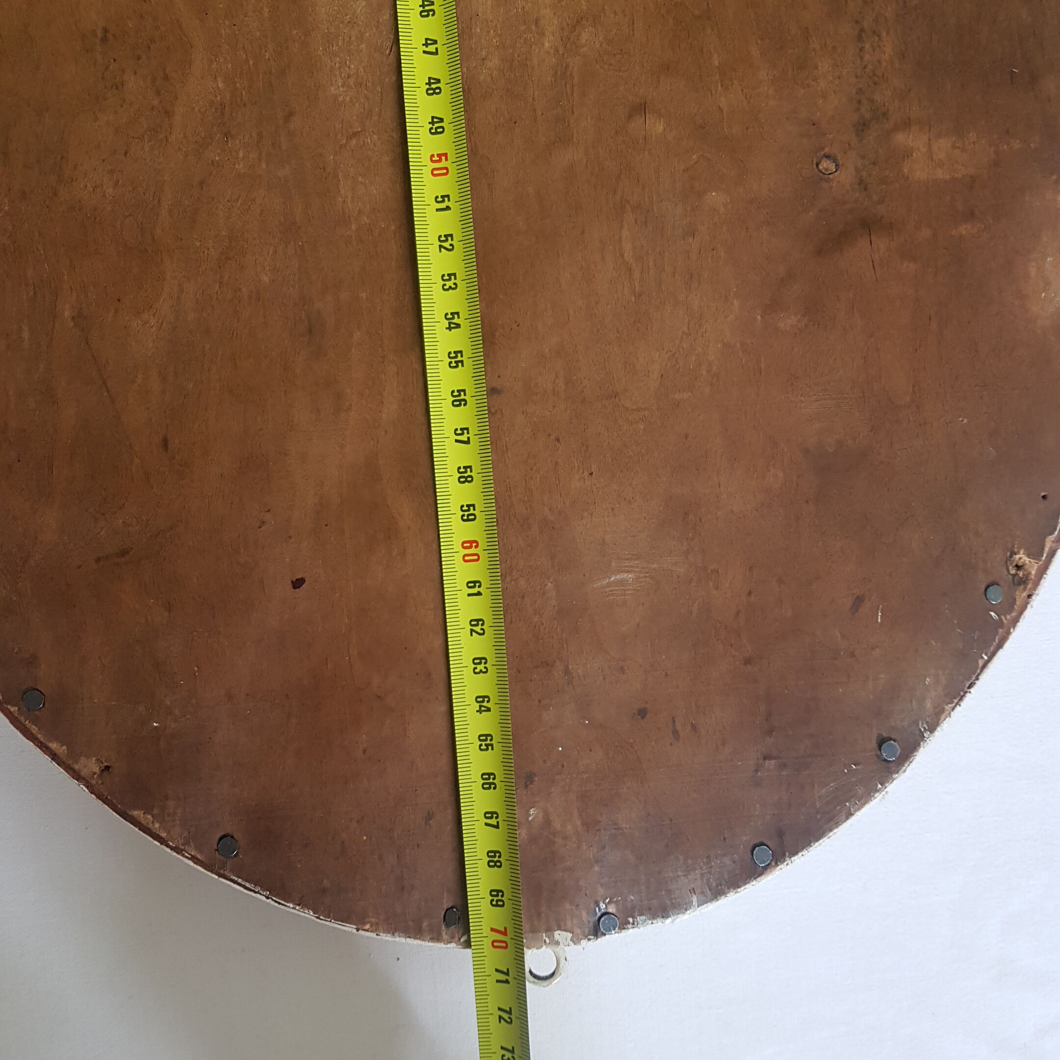 Large oval mirror with bevelled ice in stucque and wood decorated with flowers