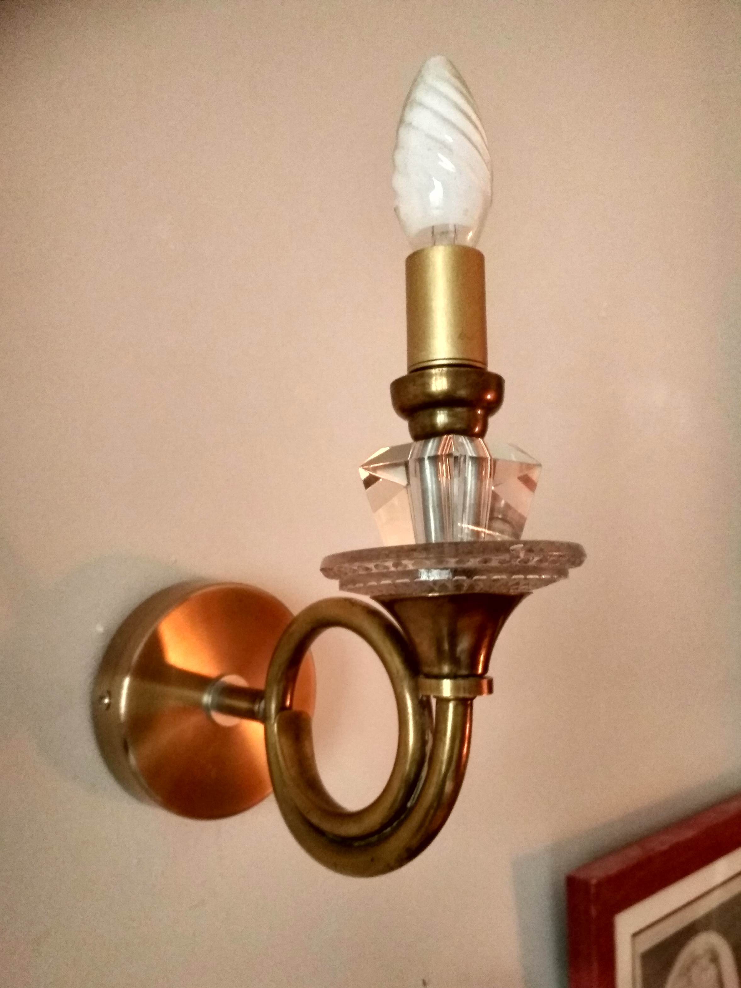 Pair of old brass wall sconces