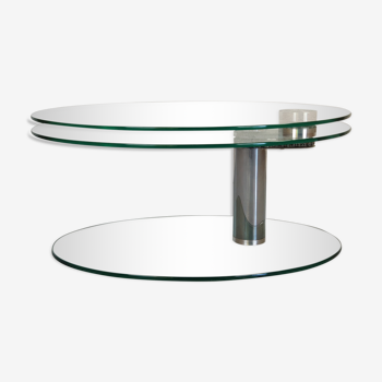 Coffee table in chrome swivel glass top