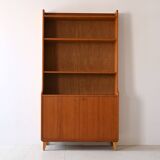 Vintage bookcase with storage compartment