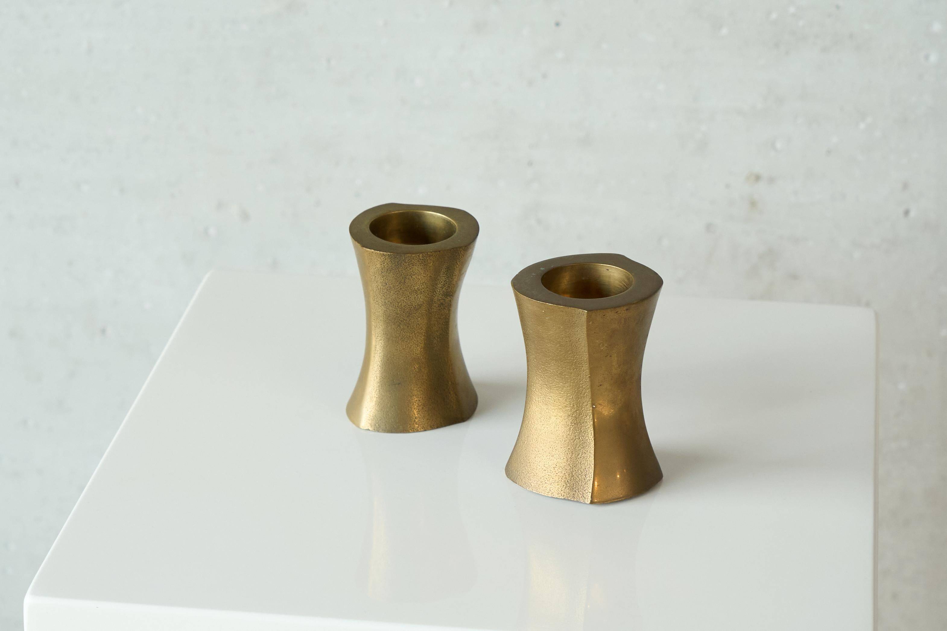 Brutalist pair of solid brass candlesticks from the 1970s.