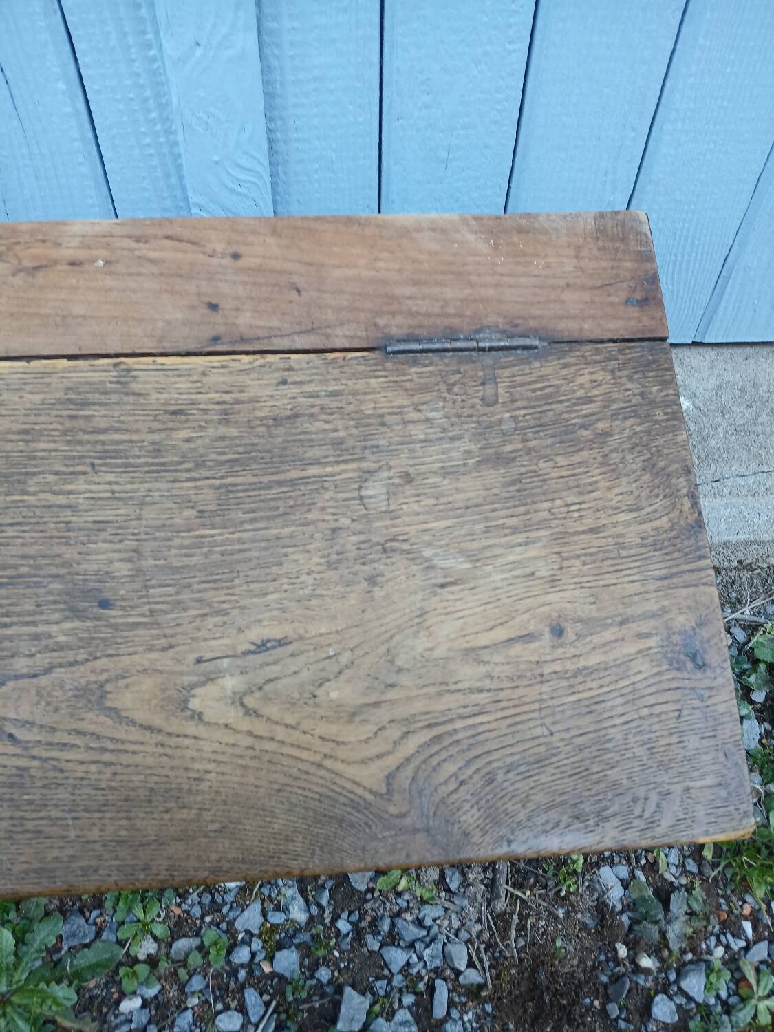 Small old wooden chest with hinged lid