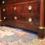 Commodity with mahogany detached columns and Empire gilded bronze ornaments