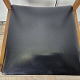 Six Scandinavian-style teak and leather dining chairs