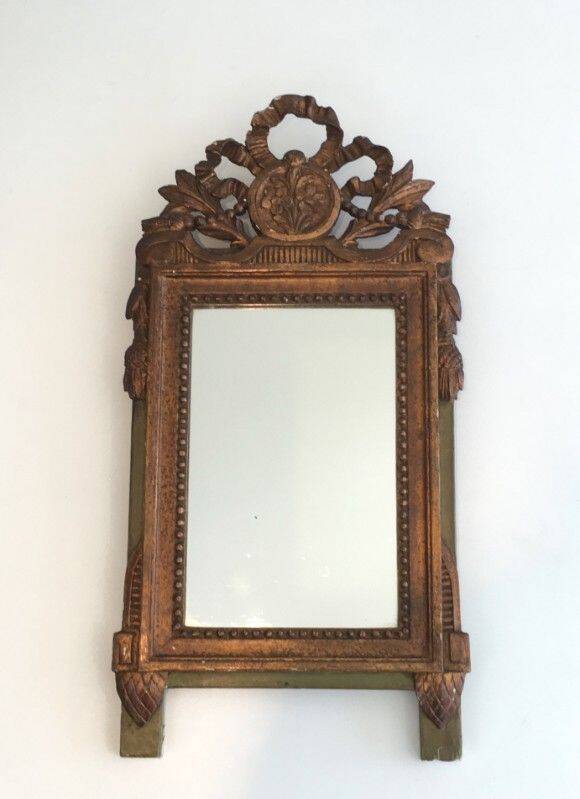 Louis XVI style mirror in patinated and gilded wood