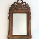 Louis XVI style mirror in patinated and gilded wood