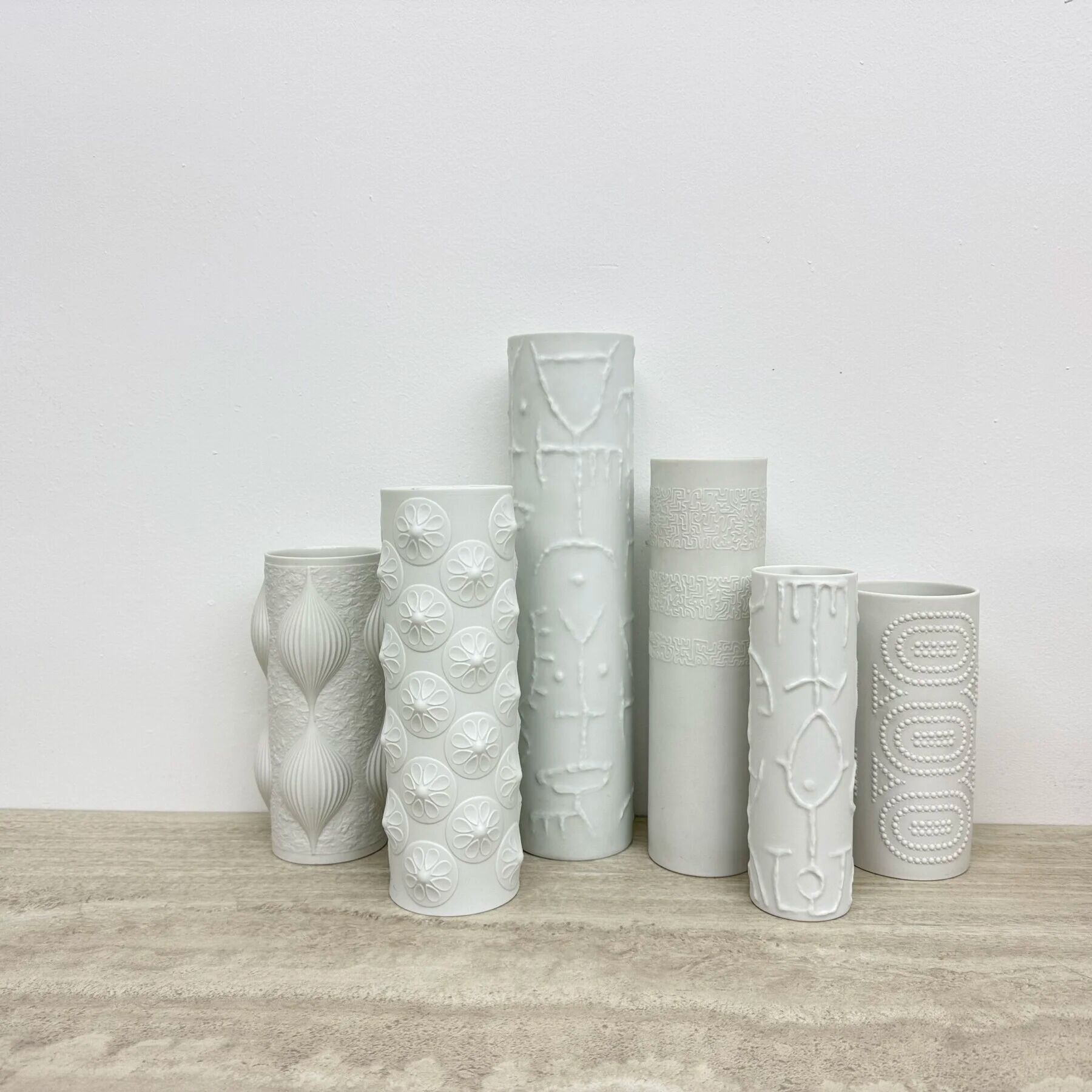 Set of 6 biscuit porcelain vases, 1970s