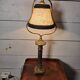 Empire-style table lamp in gilded bronze from the 19th century.