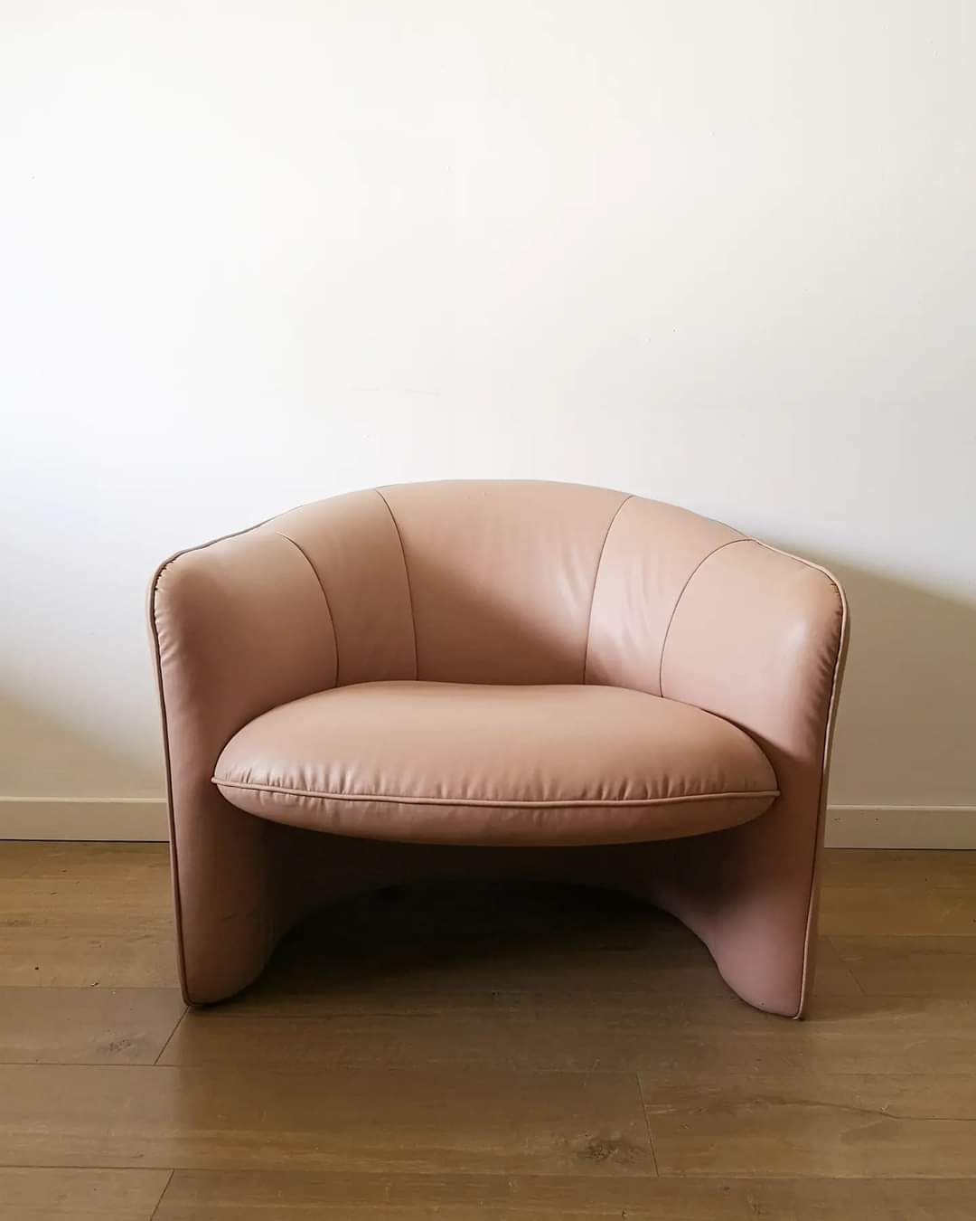 Pair of pink skai armchairs