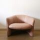 Pair of pink skai armchairs
