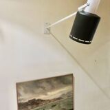 Pair of long white arm wall lights with black spot. "lita device"