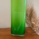 Vase en verre vert acidulé