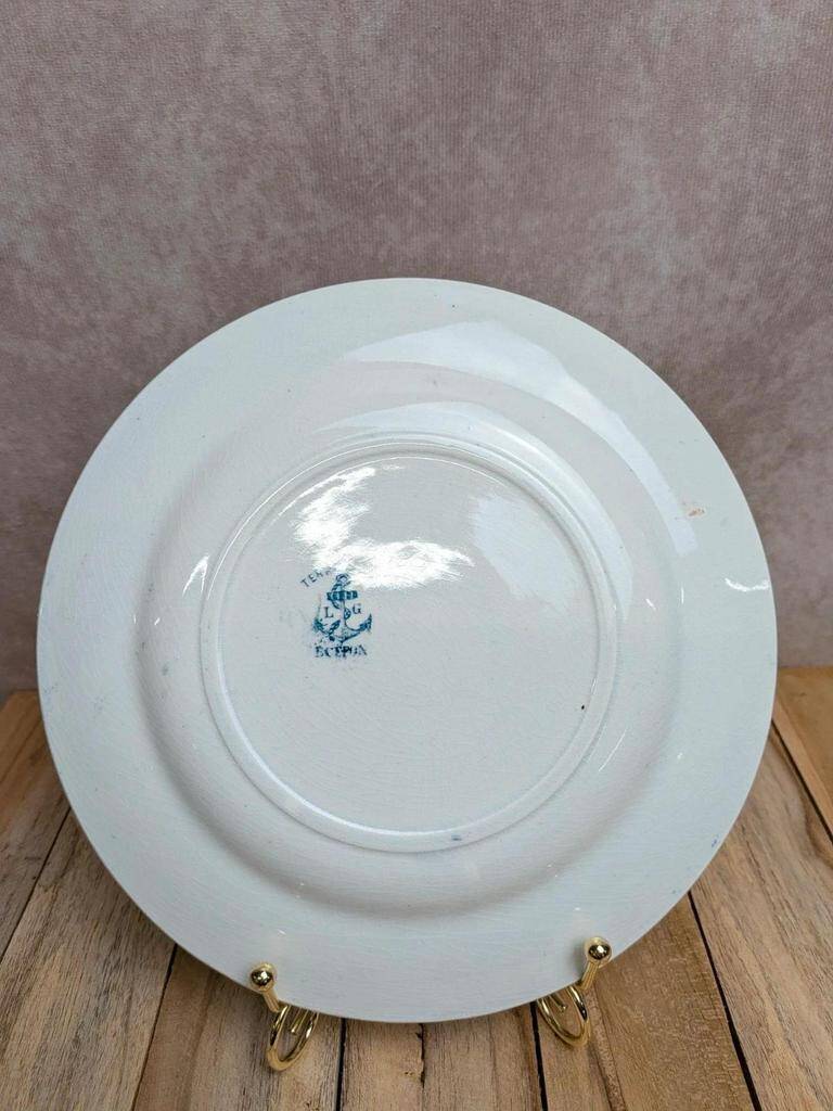 Dessert plate in ironstone Clairefontaine model Buffon blue with old landscape decoration.