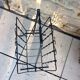 Black metal magazine holder