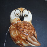 Owl arranges wire or rope