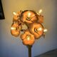 Ornamental floor lamp with "flower" patterns from the 1970s.