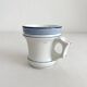 Antique porcelain teacup with blue rims, 19th century