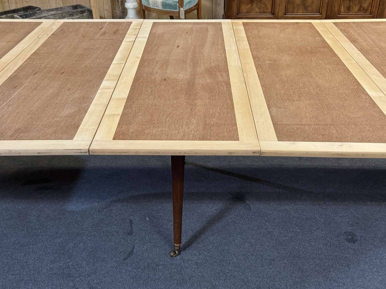 19th-century Louis XVI dining table in Cuban mahogany.