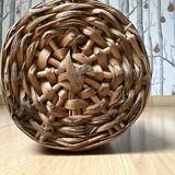 Dame jean covered in woven wicker