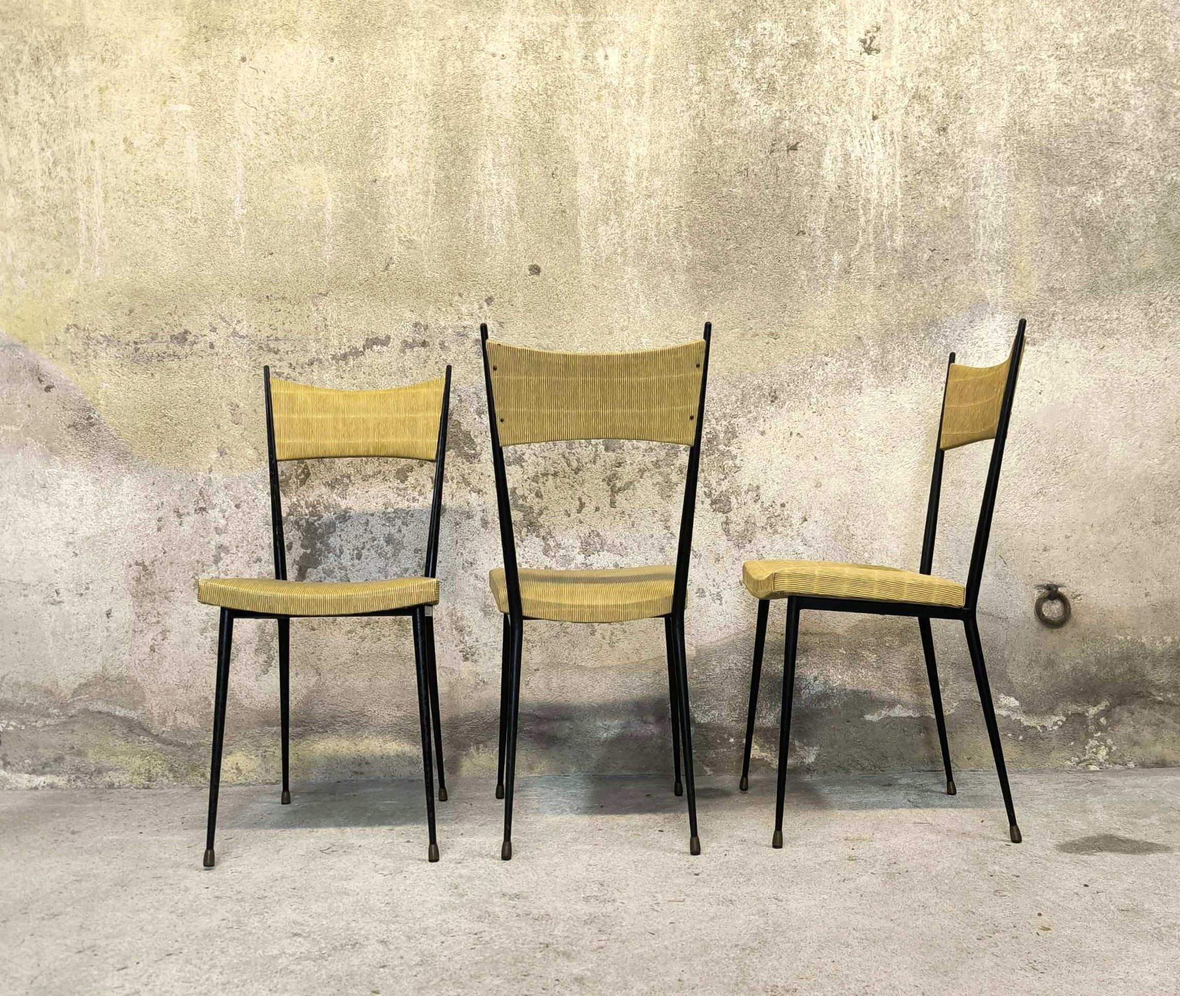 Three vintage chairs in the style of Colette Gueden.