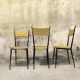 Three vintage chairs in the style of Colette Gueden.