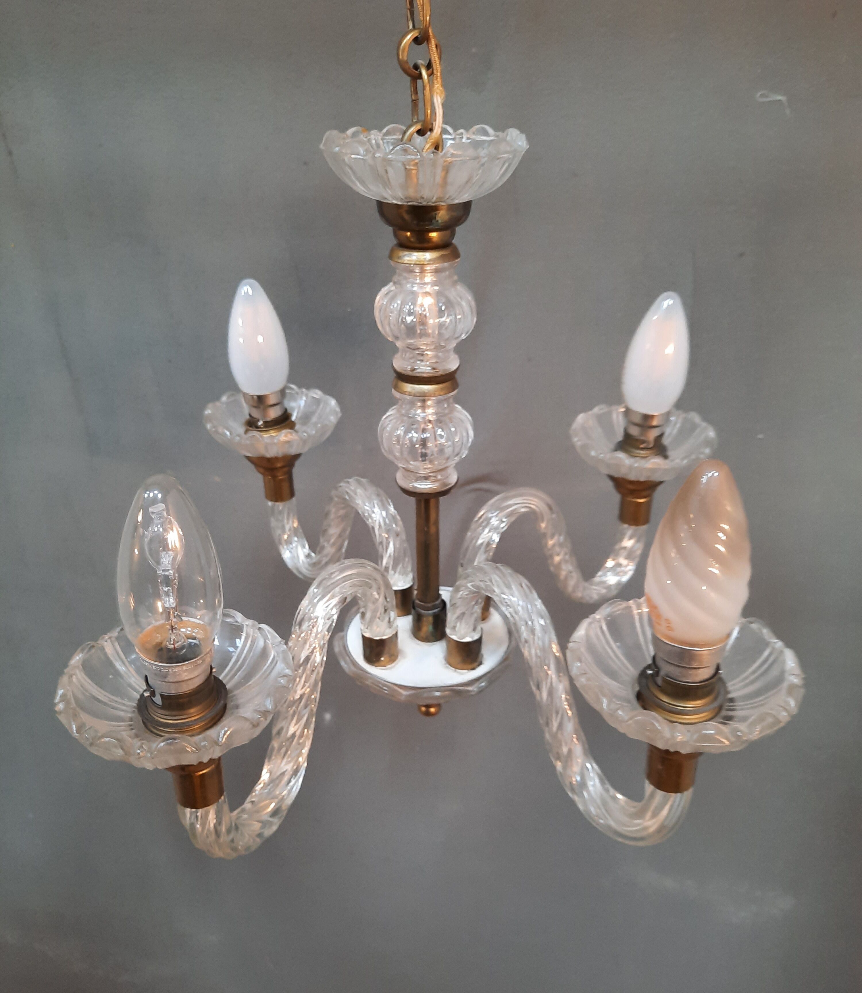 Glass chandelier has 4 lights
