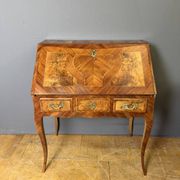 Louis XV slant-top desk in 18th-century marquetry.