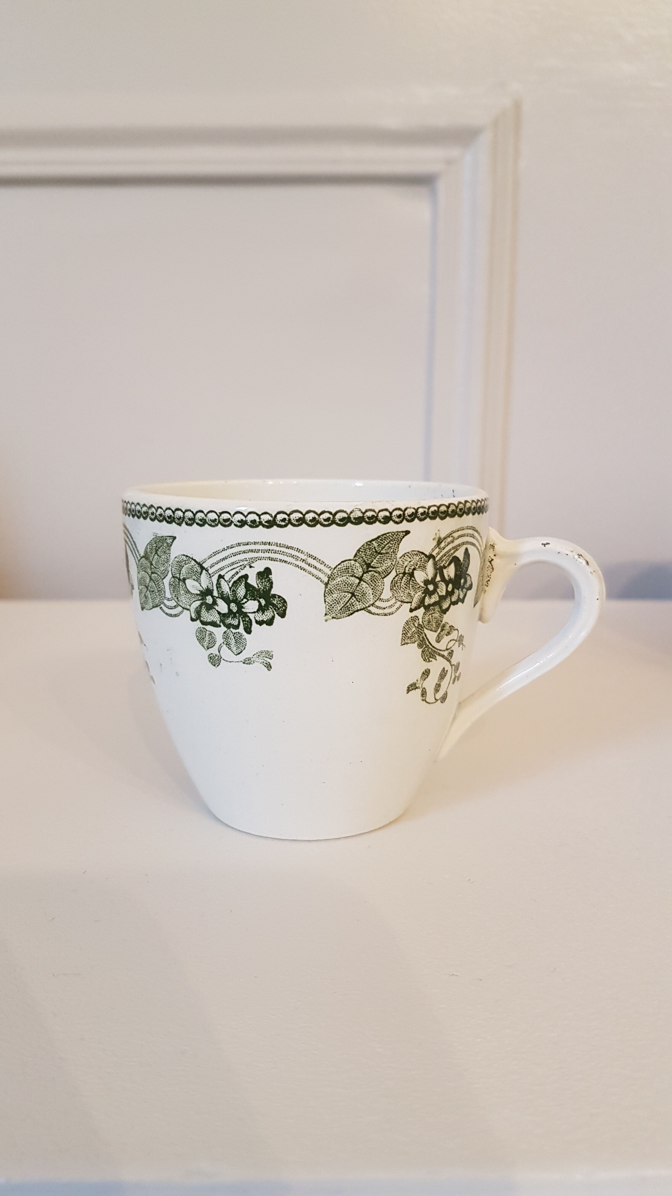 Set of 11 porcelain cups