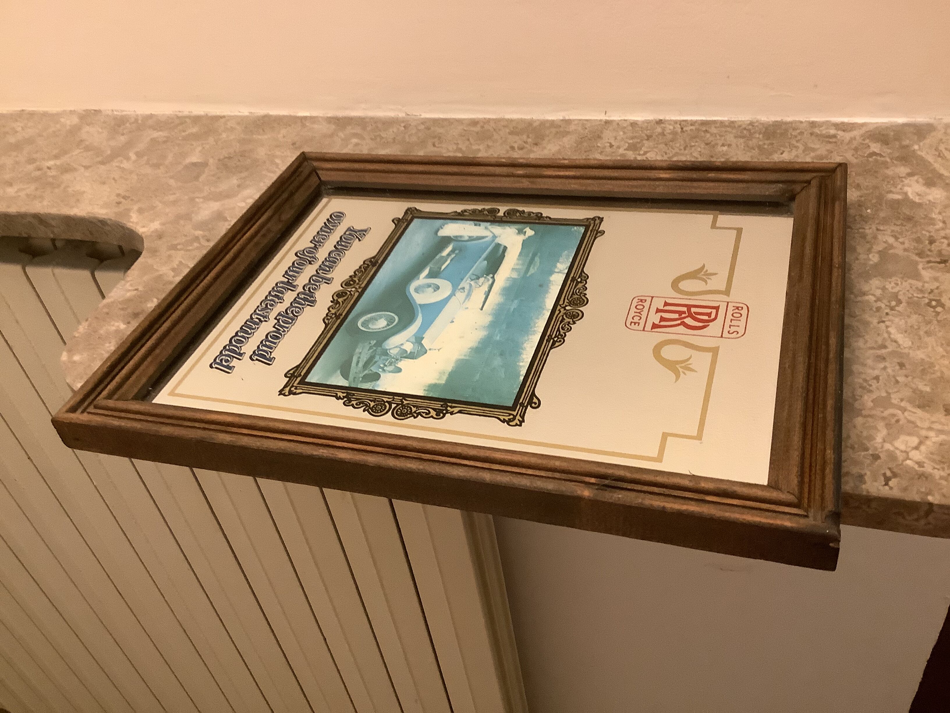 Mirror illustration of old Rolls Royce car