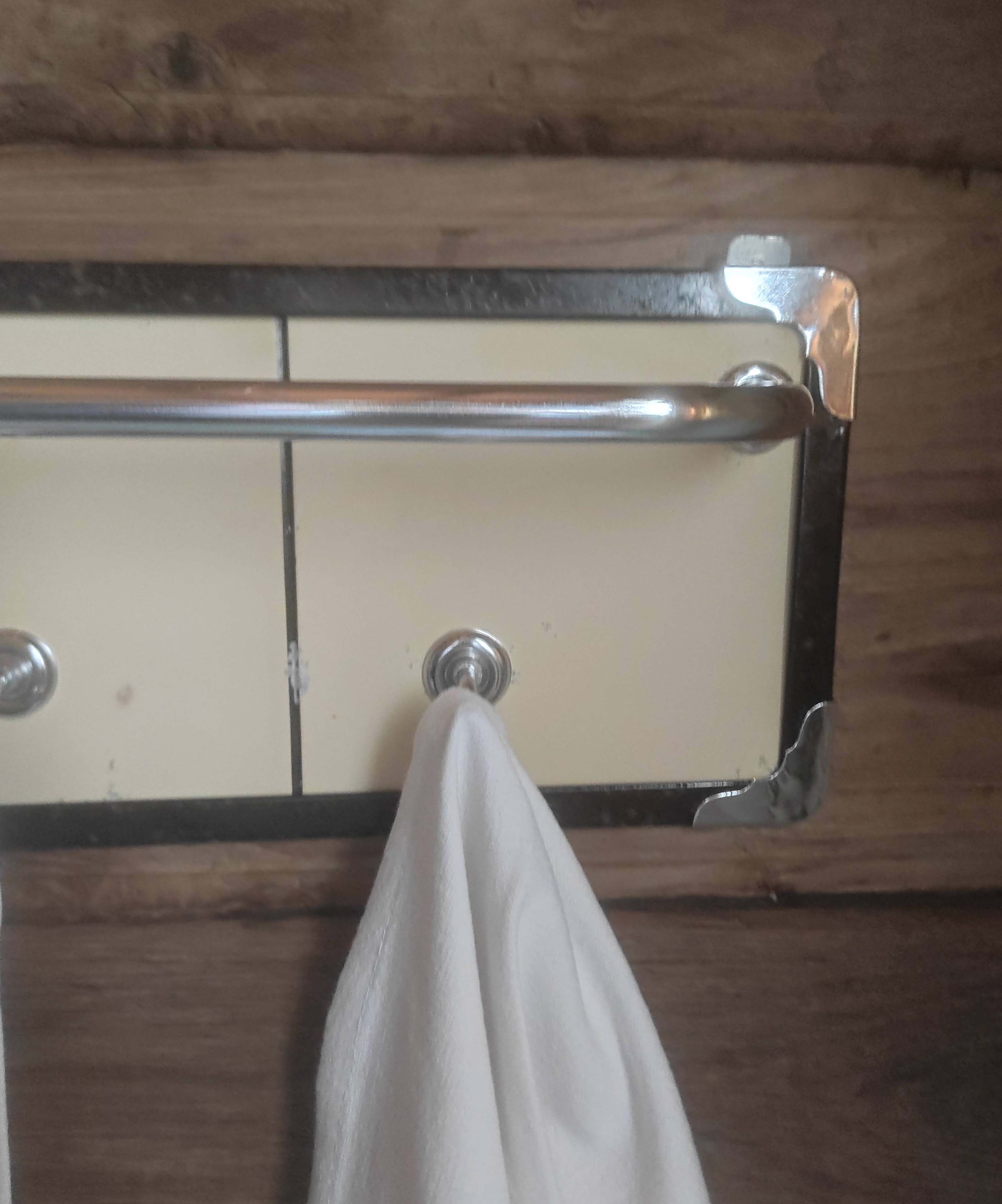 Vintage metal tea towel holder