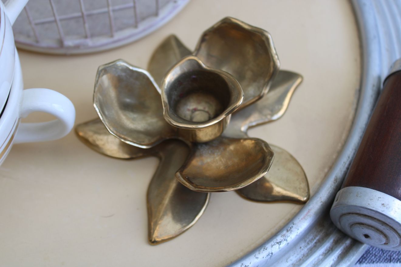 Golden brass candle holder