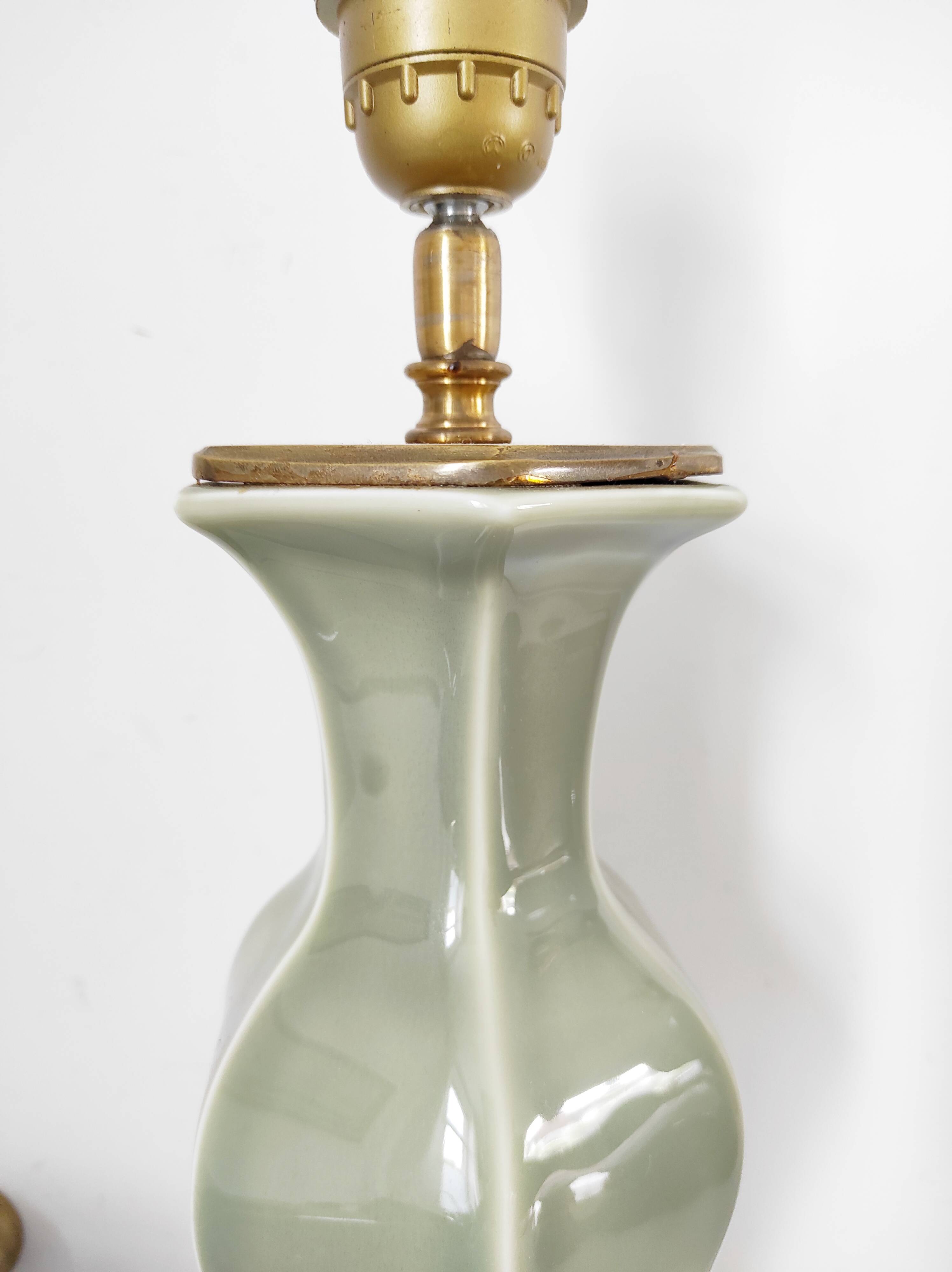 Two celadon-colored ceramic lamp bases