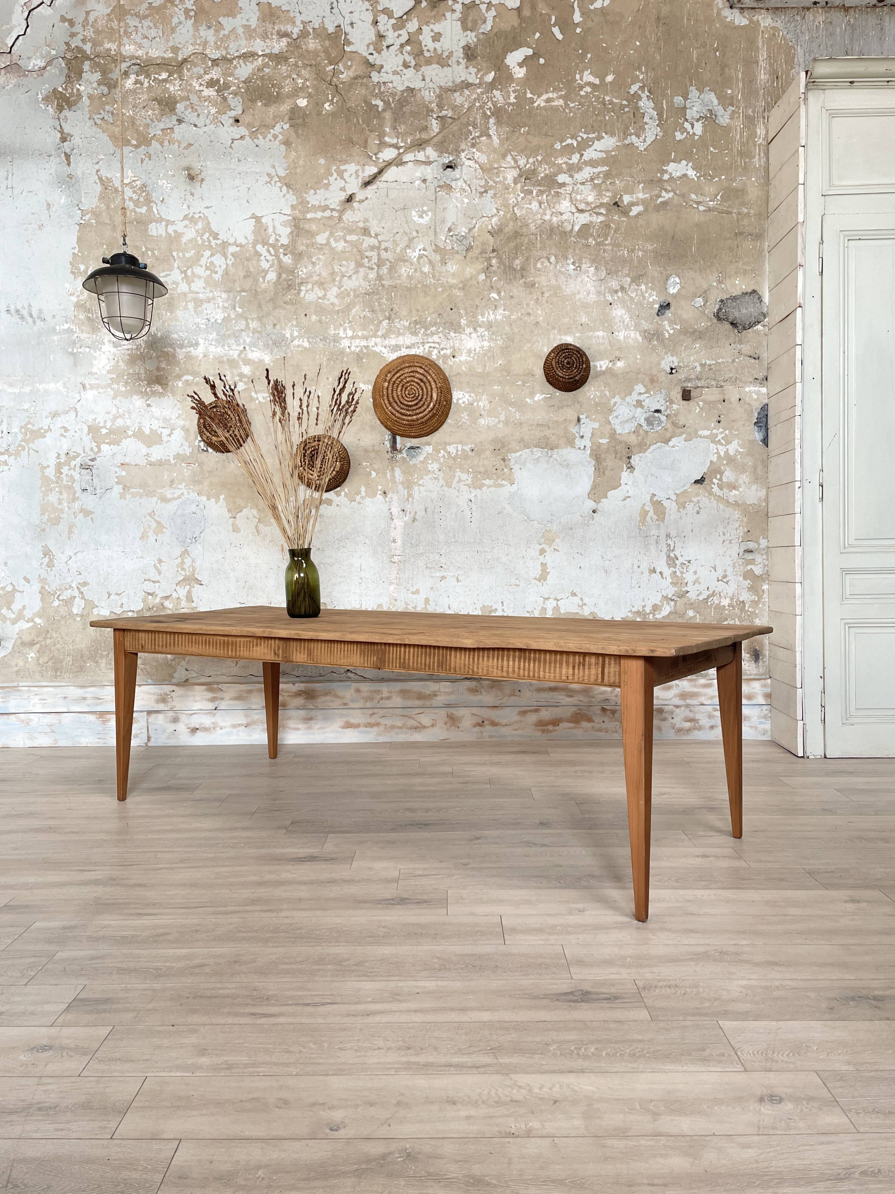 Vintage farm table with spindle legs.