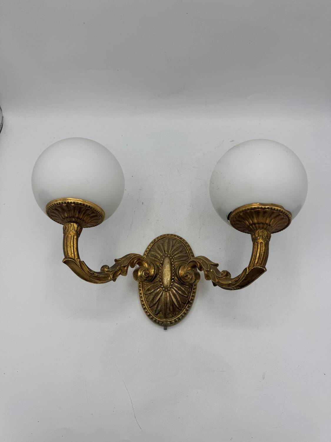 Double gold wall light