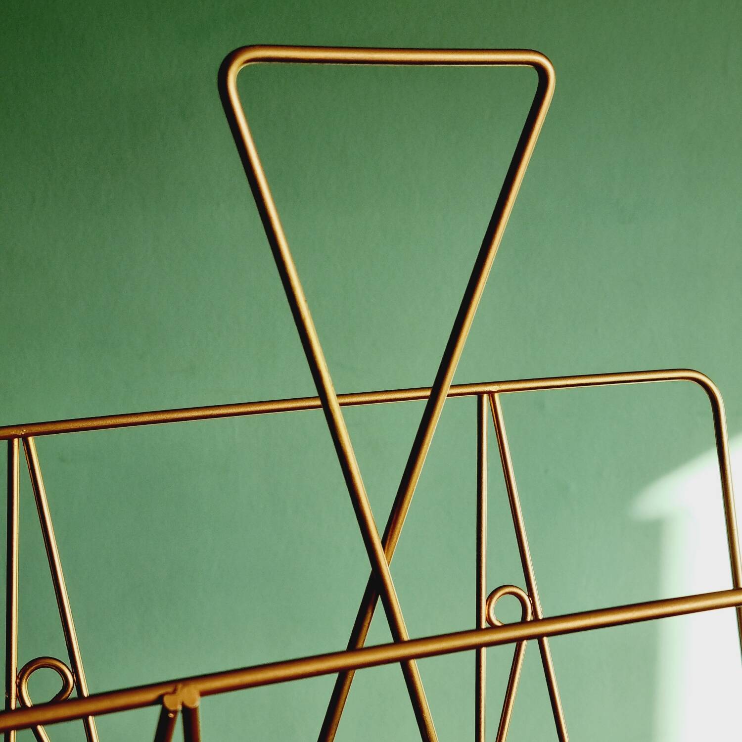 Golden metal magazine holder