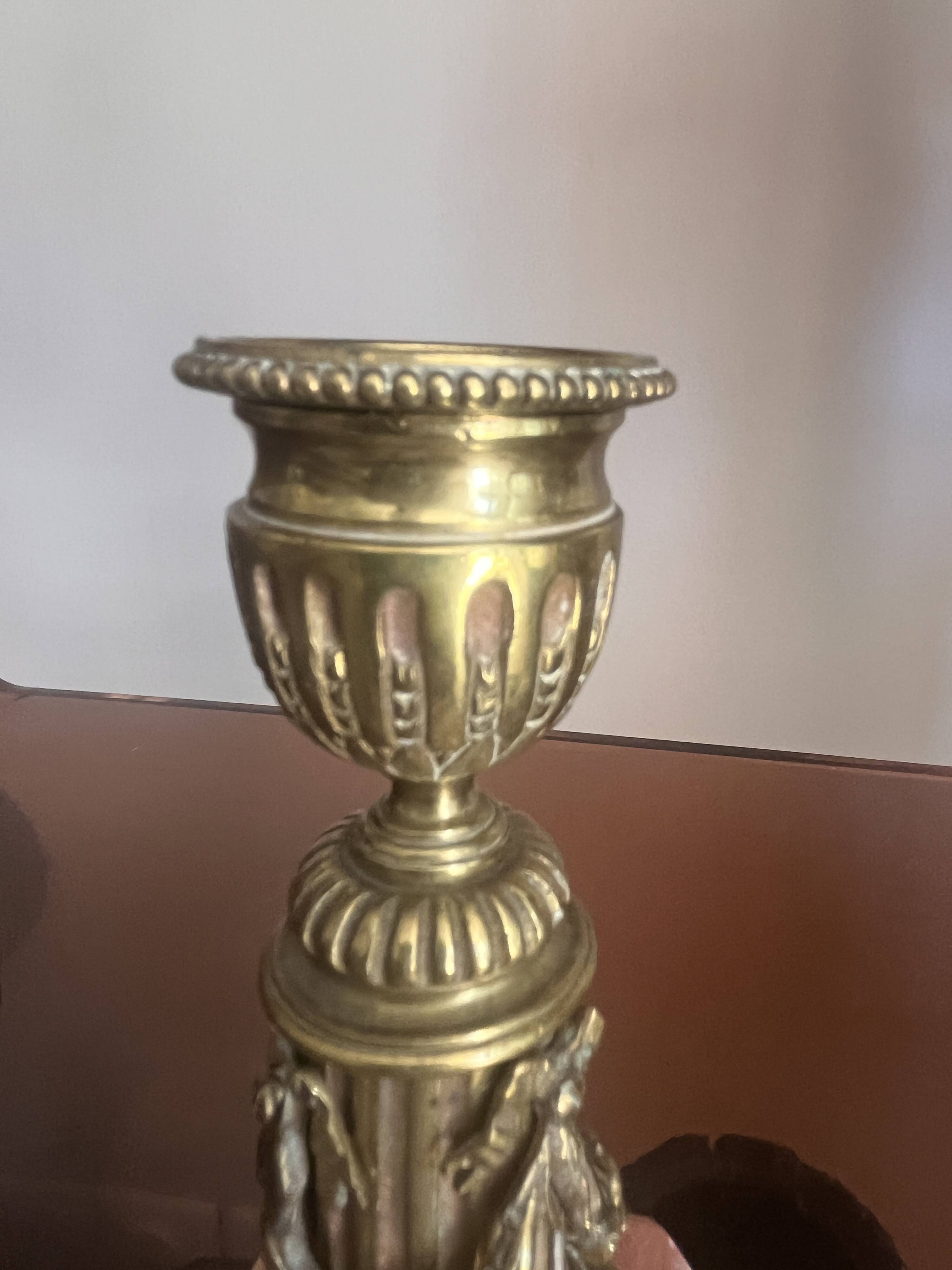 pair of antique bronze candlesticks