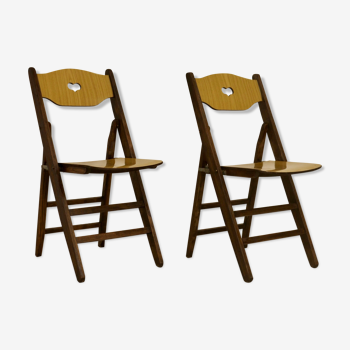 Pair of vintage folding chairs year 50 sculpted backrest.