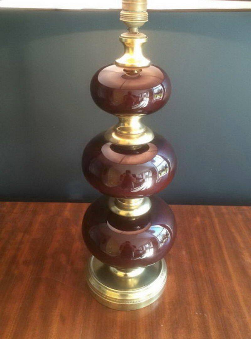 Lamp made of brass and red colored glass