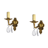 Pair of wall clams in gilded bronze stamps